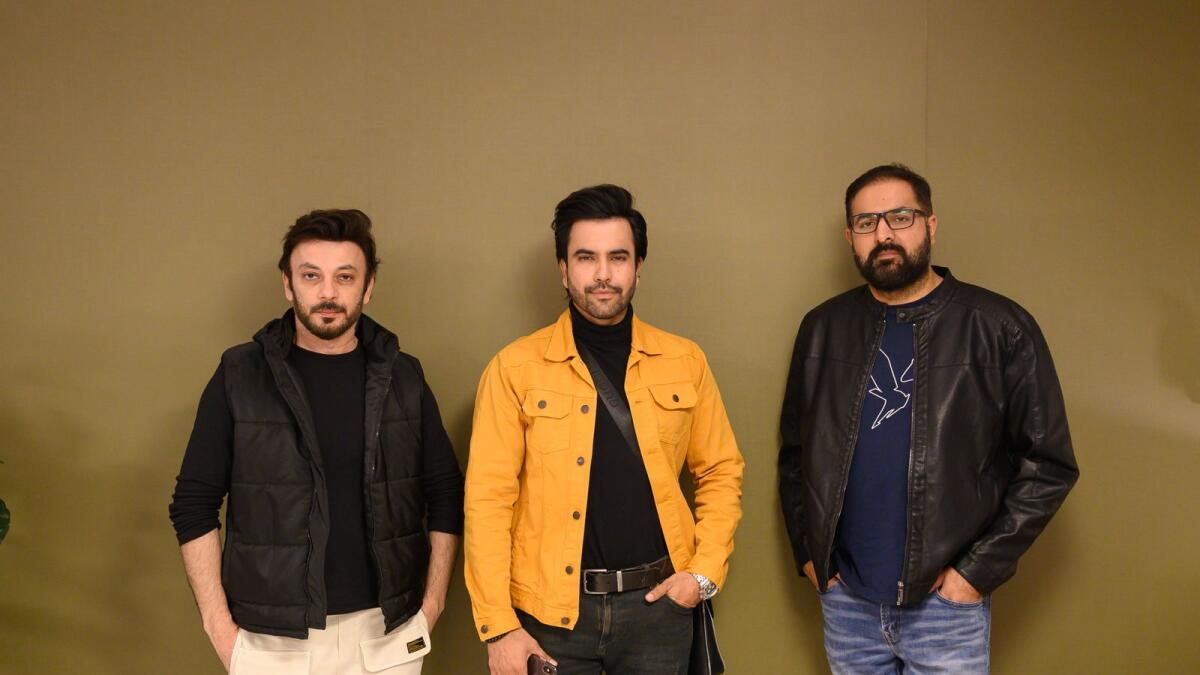 Producer Kamran Bari, Junaid Khan, and musician Atif Ali