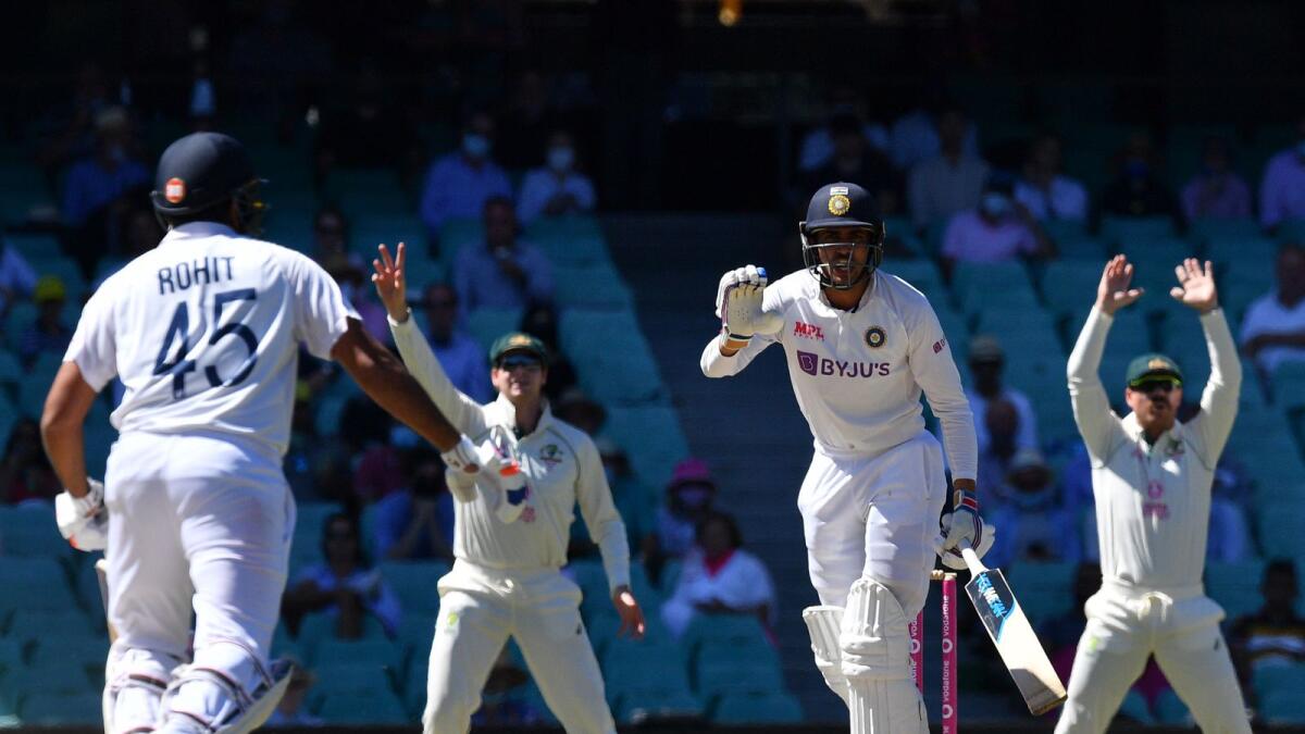 Australian fielders appeal for the wicket of India's Shubman Gill. (AFP)