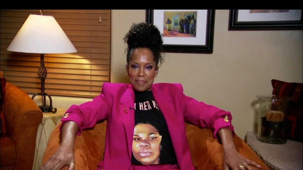 Winner Regina King paired a pink power suit with a tee-shirt bearing the image of Breonna Taylor, an African-American woman killed in a police shooting in her own home, and the words “Say Her Name.”