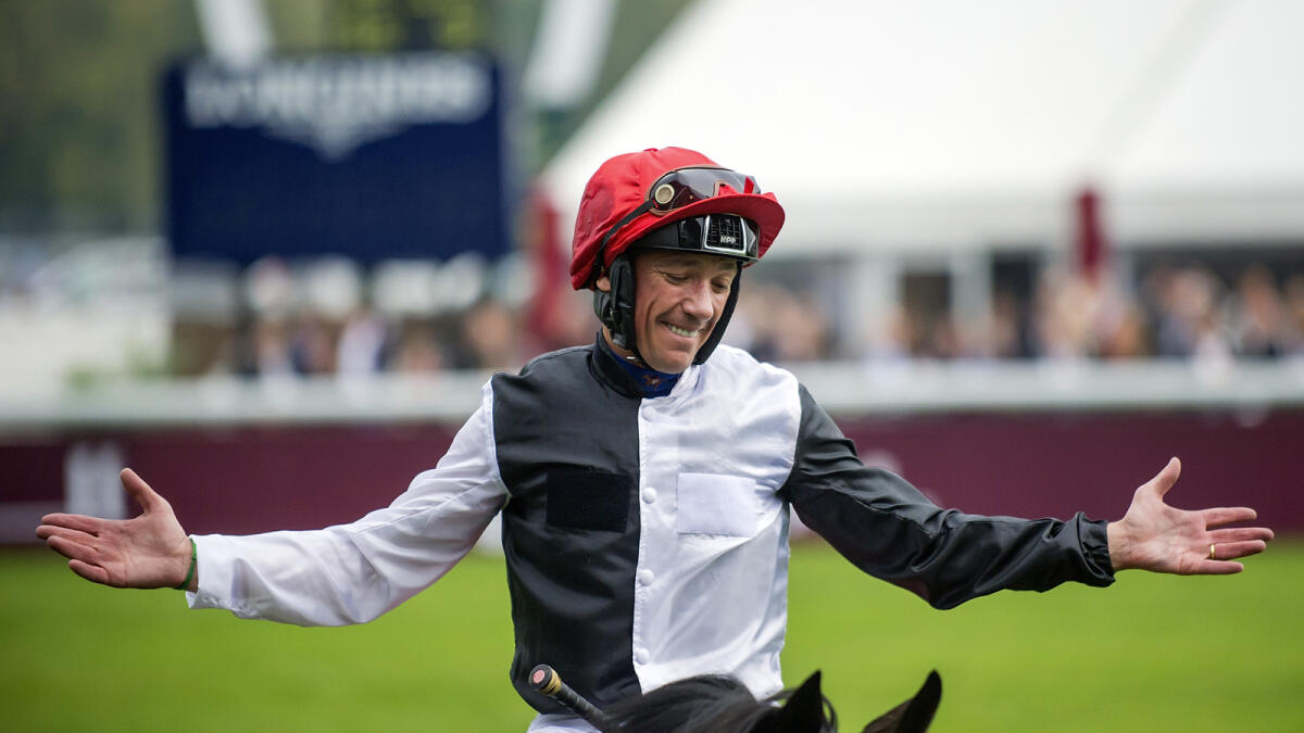 Italian jockey Frankie Dettori reacts after   winning the Qatar Prix de l'Arc de Triomphe horse race, riding Golden Horn, at the Longchamp horse racetrack, outside Paris, Sunday, Oct. 4, 2015. (AP Photo/Kamil Zihnioglu)
