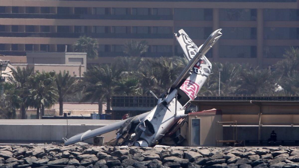 An aircraft belonging to Skydive Dubai is seen after crashing off the runway. 