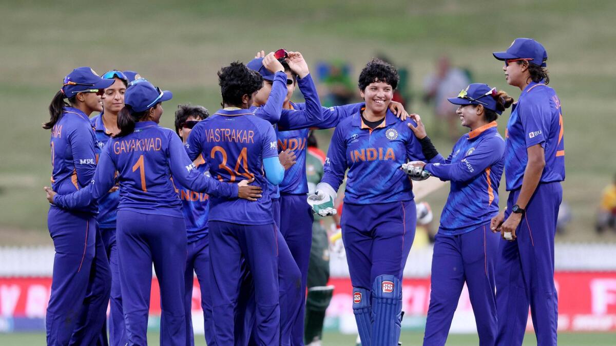 India's players celebrate the wicket of Bangladesh's Fargana Hoque Pinky. (AFP)