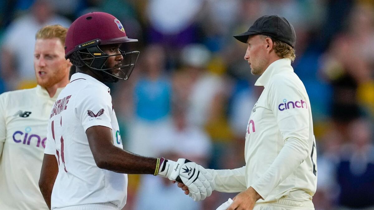 England captain Joe Root (right) shakes hands with West Indies captain Kraigg Brathwaite. (AP)