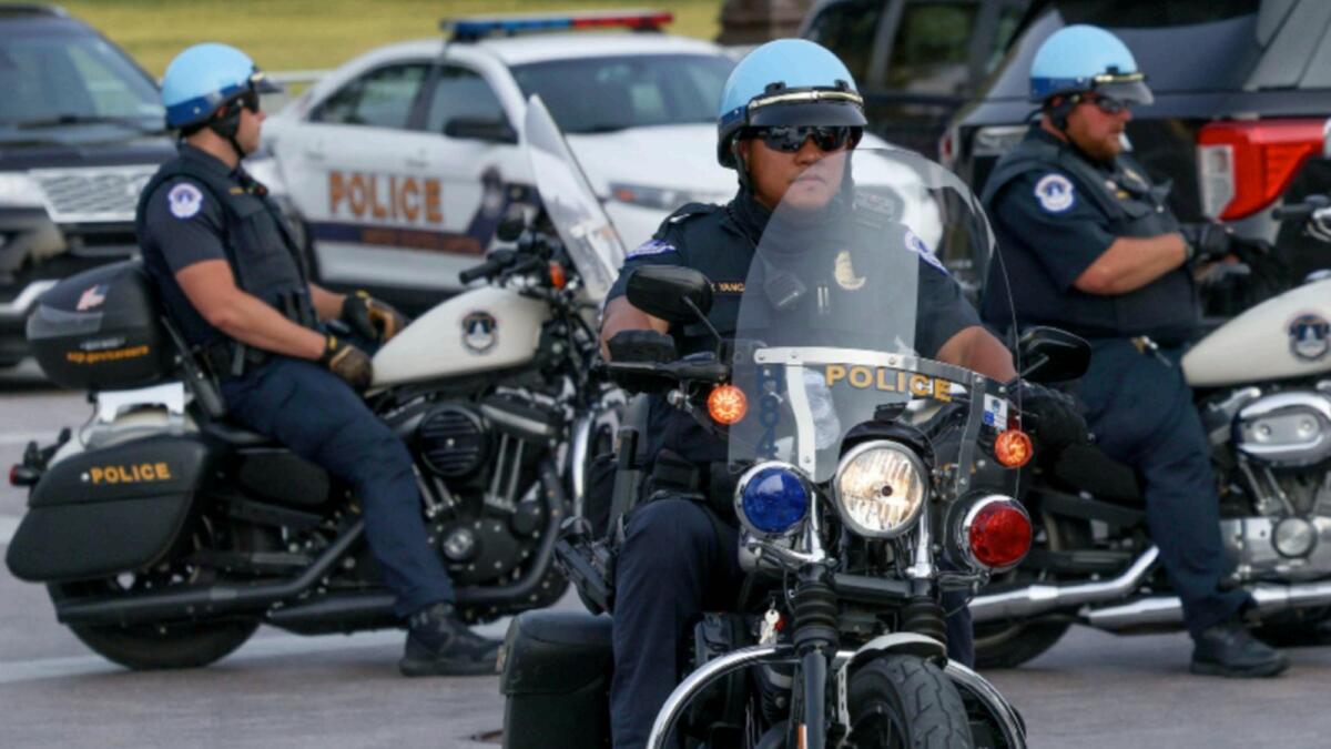Capitol police on motorcycles sit outside the United States Capitol building in Washington. — Reuters