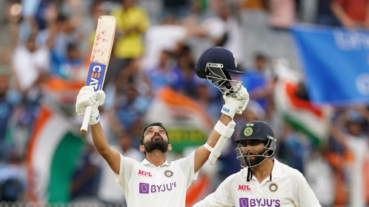 India's Ajinkya Rahane celebrates after reaching his century as his teammate Ravindra Jadeja looks on. (AP)