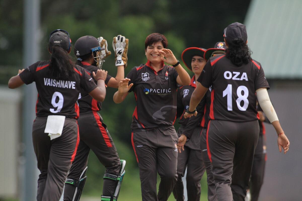 UAE captain Chaya Mughal (centre) celebrates a wicket with her teammates at the Asian T20 Championships. (Supplied photo)