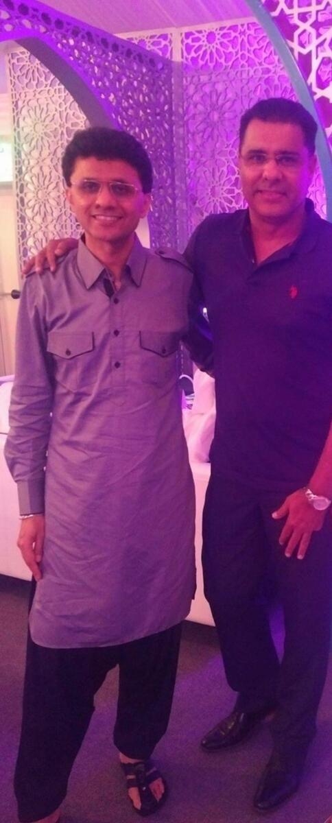 Anis Sajan (left) with Waqar Younis. — Supplied photo 