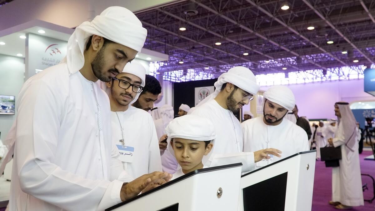Visitors complete their registration at Etisalat stall at the opening day of National Career Fair 2019 at Expo Center in Sharjah – Photo by M. Sajjad