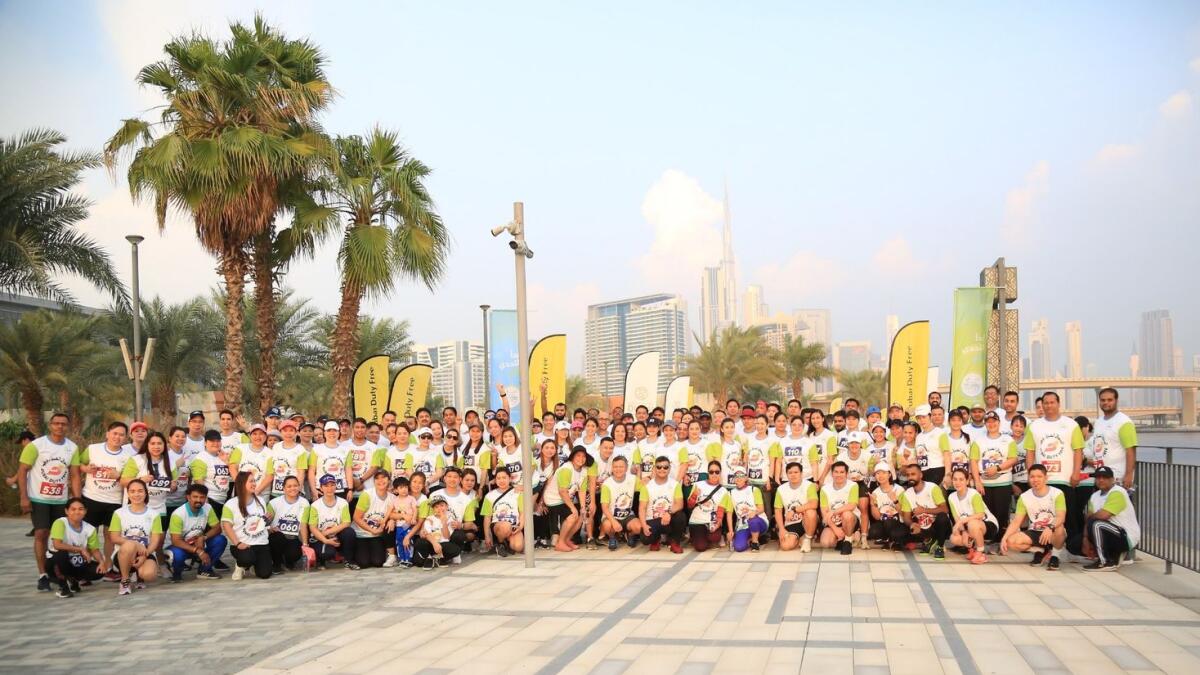 Close to 200 employees of Dubai Duty Free and The Irish Village participated in the 'fun run'. - Supplied photo