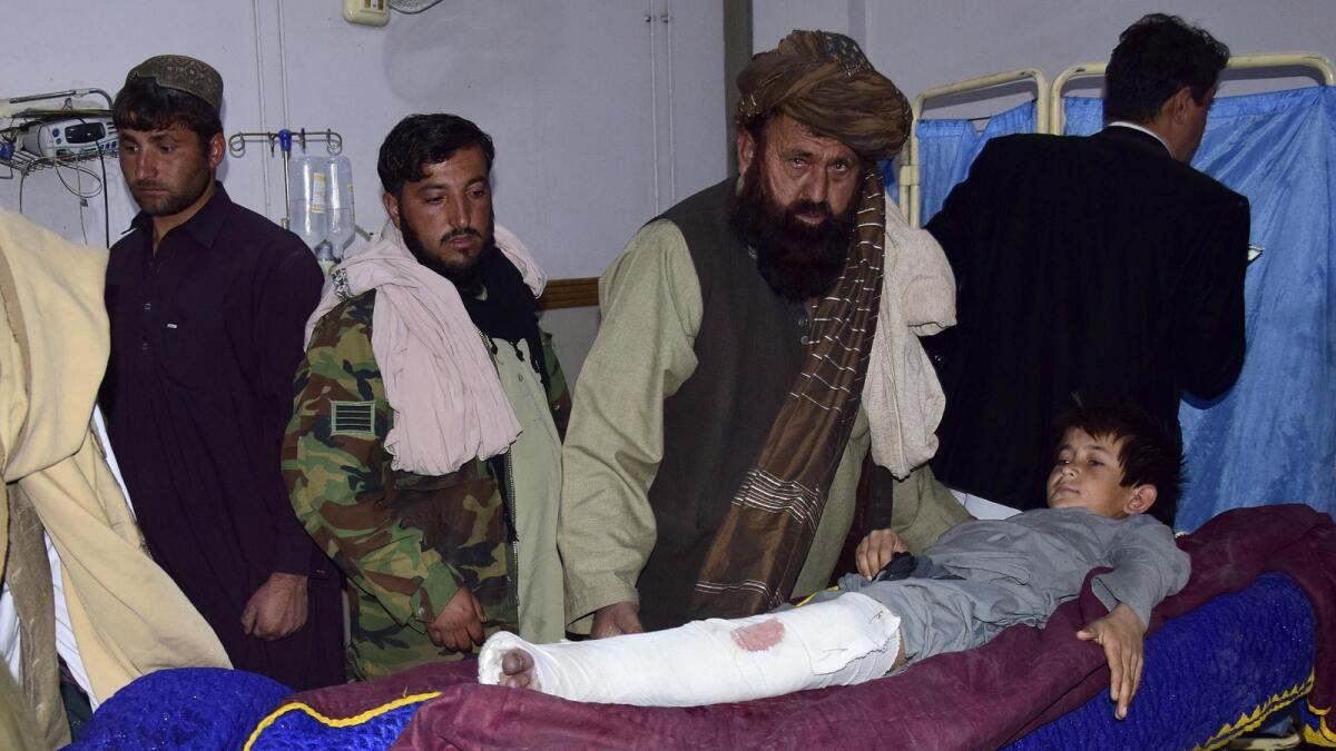 A boy, who was injured in the Afghan forces shelling, is treated in a hospital, in Quetta, Pakistan, on Sunday. — AP