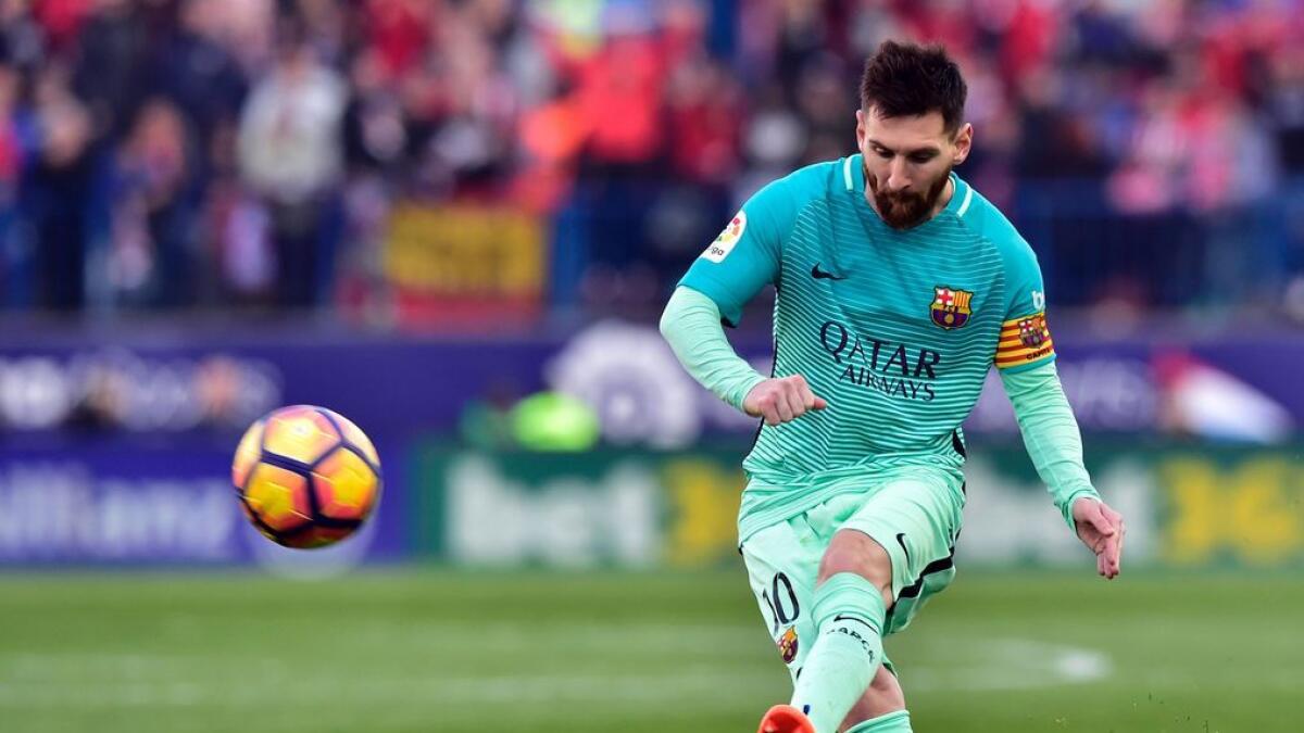 Football: Messi winner haunts Atletico once more as Barca move to the top