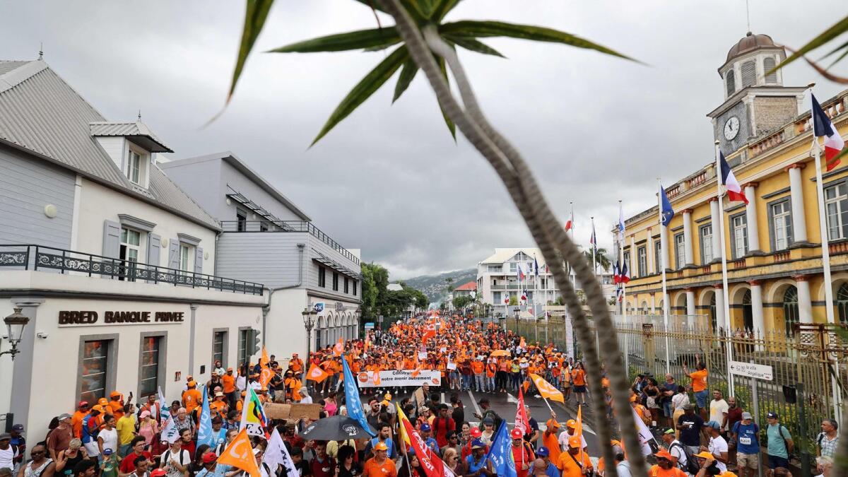 Protesters demonstrate in Saint-Denis de la Reunion on the French Indian island of La Reunion. — AFP