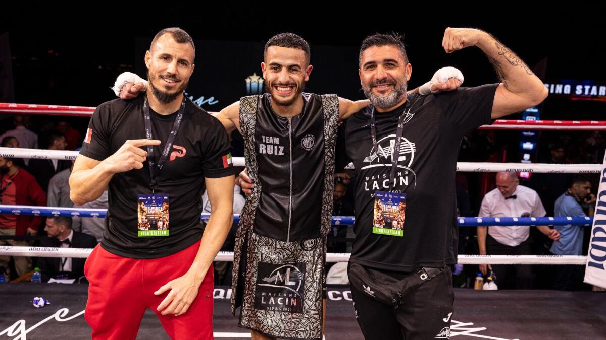 Moroccan super featherweight Jaouad ‘The Moroccan Bomber’ Belmehdi  and his team celebrate after he defeated previously unbeaten Ghanian Alfred Lamptey. - Supplied photo