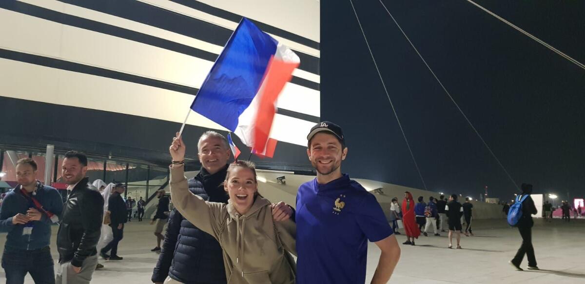 French fans Christophe, Sacha and Alex after France’s win over England. Photo by Rituraj