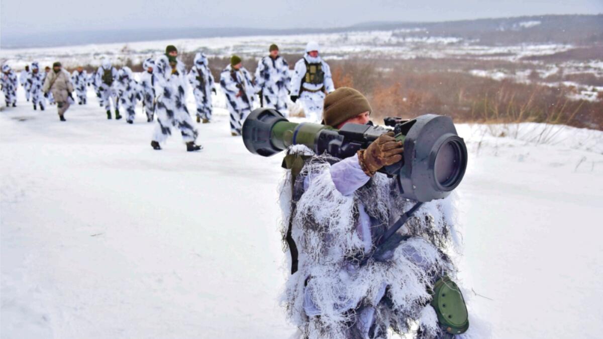 Soldiers take part in an exercise for the use of NLAW anti-aircraft missiles on the Yavoriv military training ground, close to Lviv, western Ukraine. — AP