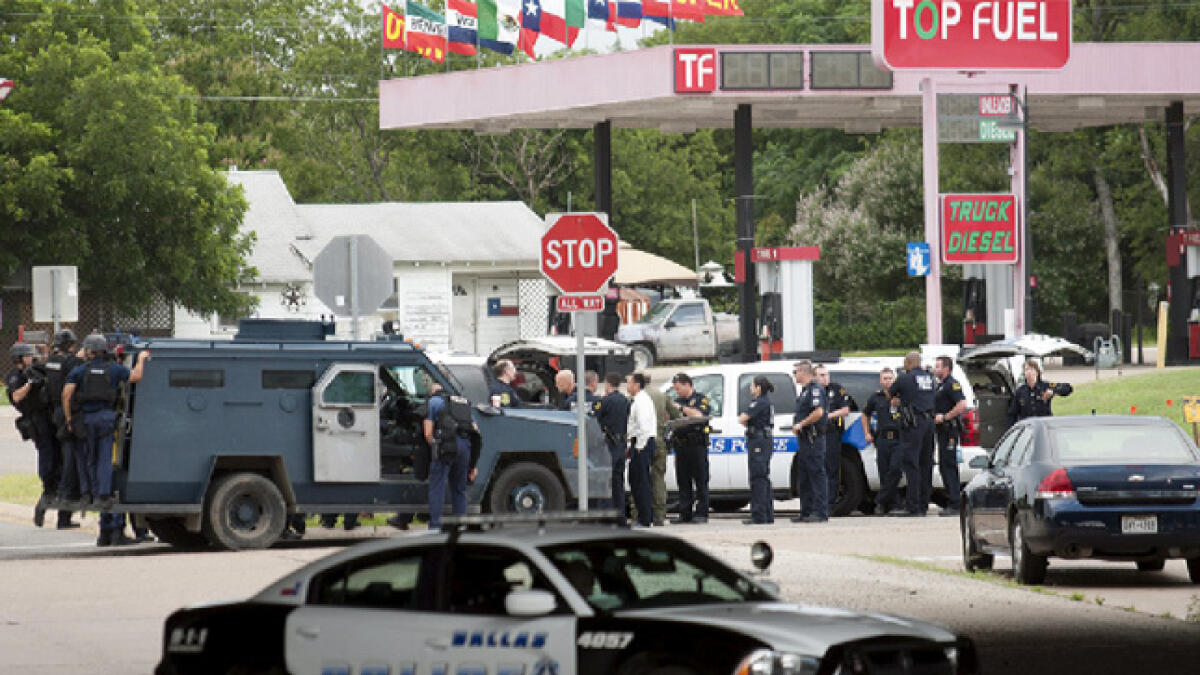 Suspect dead after gun, bomb attack on Dallas police HQ