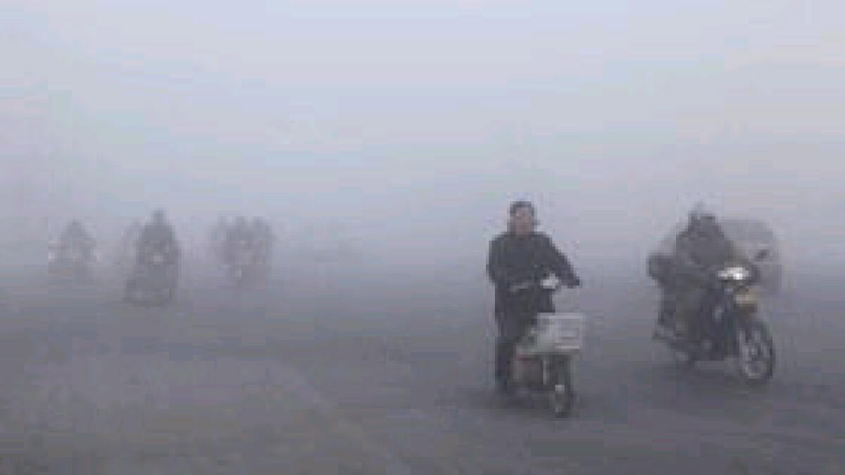 ‘Off the scale’ smog envelops Beijing again