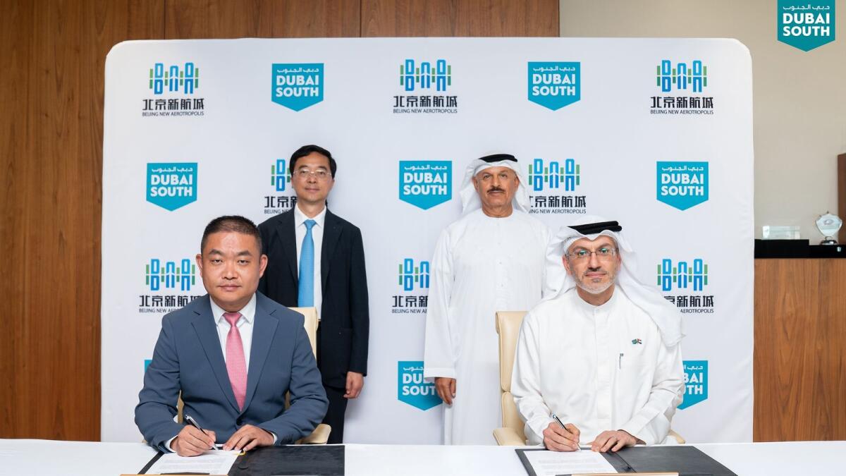 The agreement was signed by Zhigang Liu, Chairman of Beijing New Aerotropolis, and Mohsen Ahmad, CEO of the Logistics District, Dubai South, in the presence of Khalifa Al Zaffin, Executive Chairman of Dubai Aviation City Corporation and Dubai South, and Wang Youguo, Secretary of Beijing Daxing District Committee of the Communist Party of China. — Supplied photo