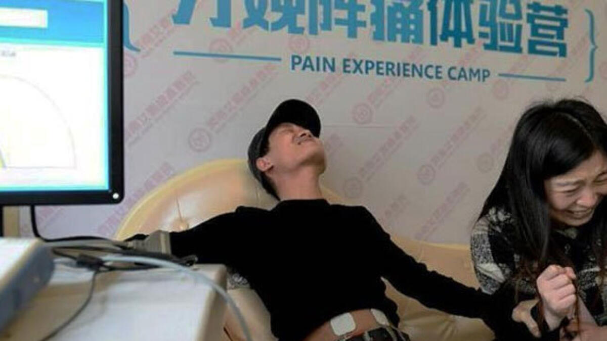Chinese men experience the pain of childbirth