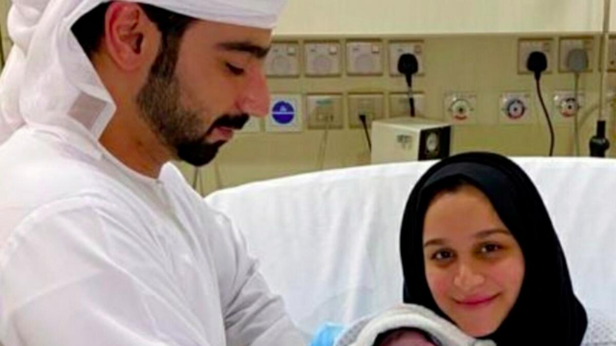Muna Mohammed Hussein and Yousif Al Blooki  hold their third baby named Abdulrahman.