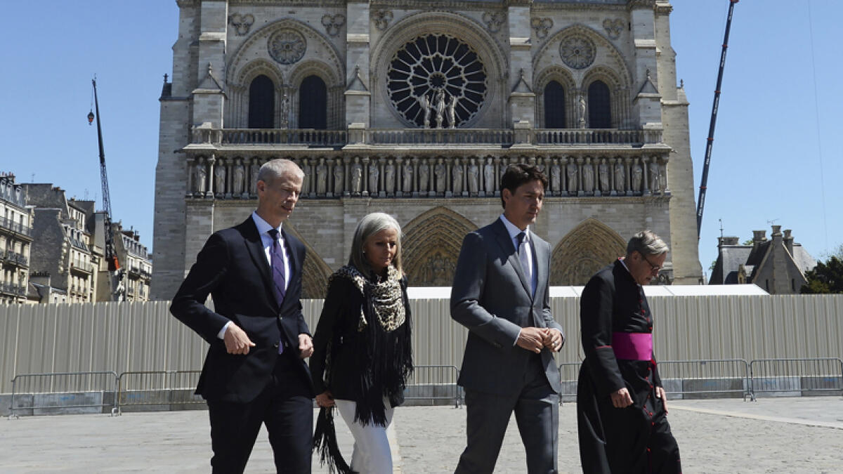 Canadian PM visits ravaged Notre Dame to show solidarity