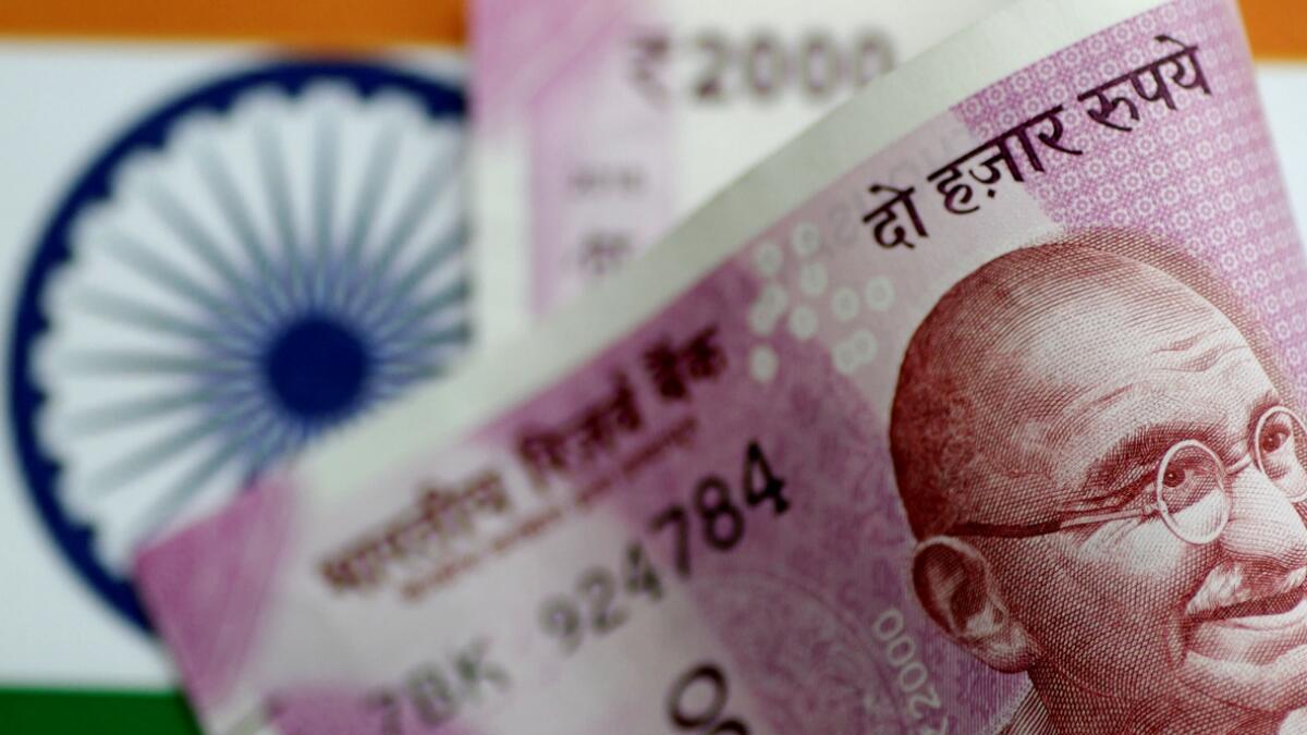 Rupee sheds against dollar in early trade ahead of RBI board meet