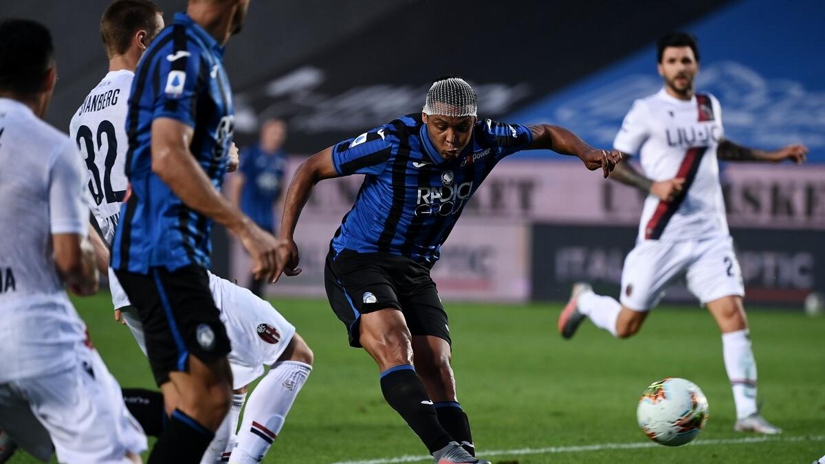 Atalanta's forward Luis Muriel scores a goal against Bologna. (AFP)