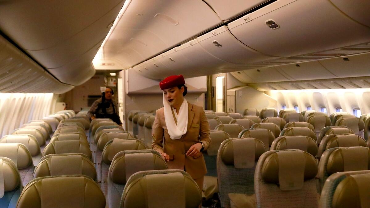 A flight attendant walks inside the plane after it lands in Mexico.