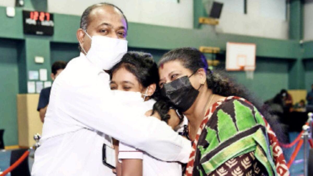 Students and parents celebrate after the CBSE Grade 12 results were announced on Friday. — Supplied photo