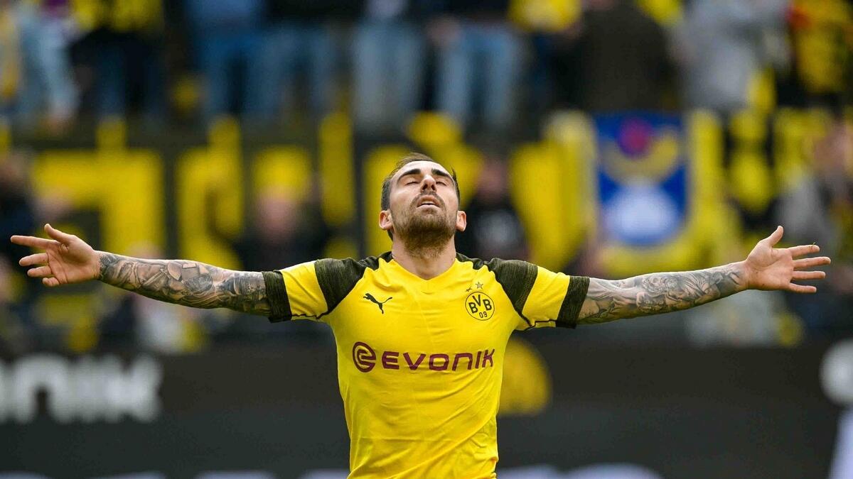 Late Alcacer double sends Dortmund two points clear at top