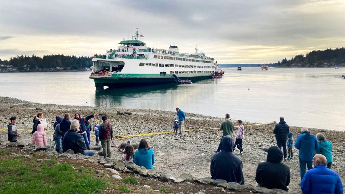 The ferry ran aground in Rich Passage near Bainbridge Island west of Seattle. — AP