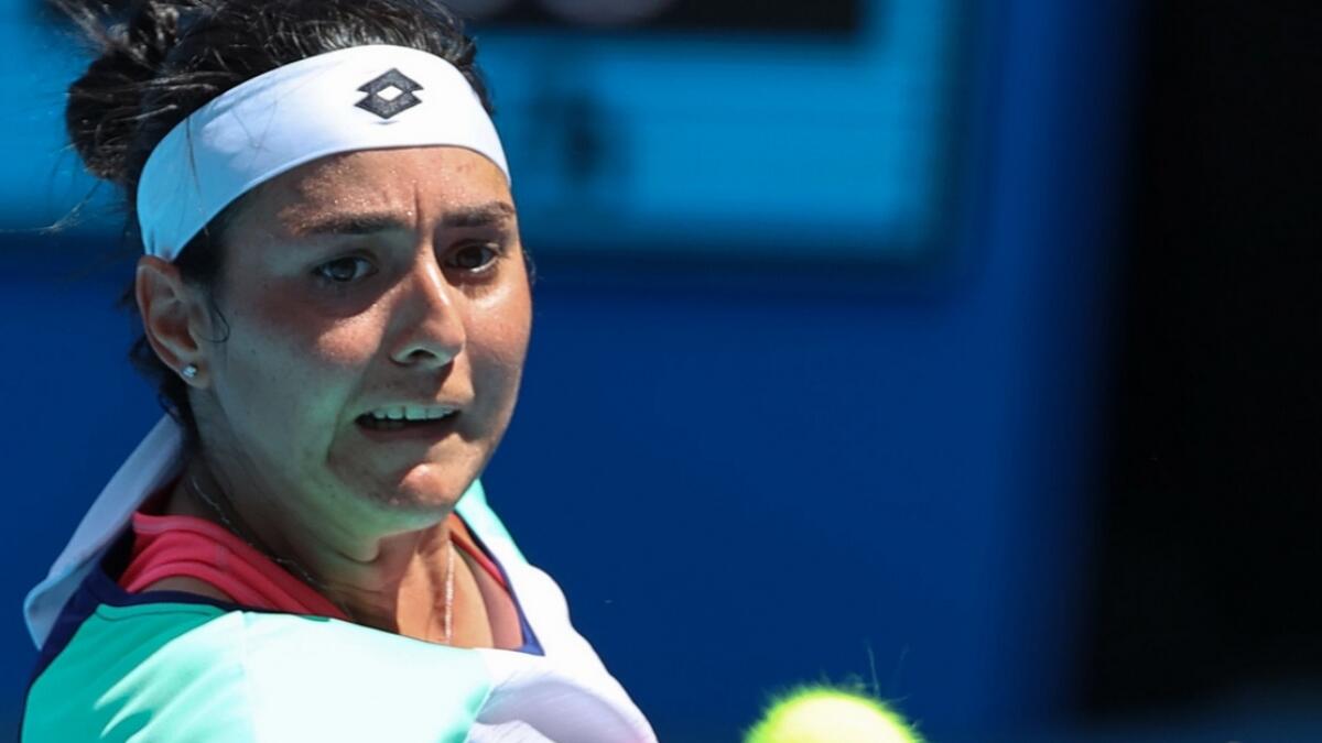 Tunisia’s Ons Jabeur hits a return against Sofia Kenin of the US