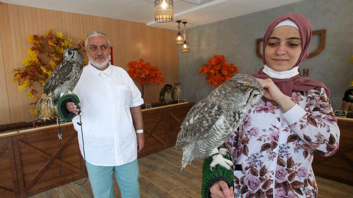 CT060421-RL-OWLCAFE Visitors at Boomah Owl Cafe in Abu Dhabi. Photo by Ryan Lim/Khaleej Times