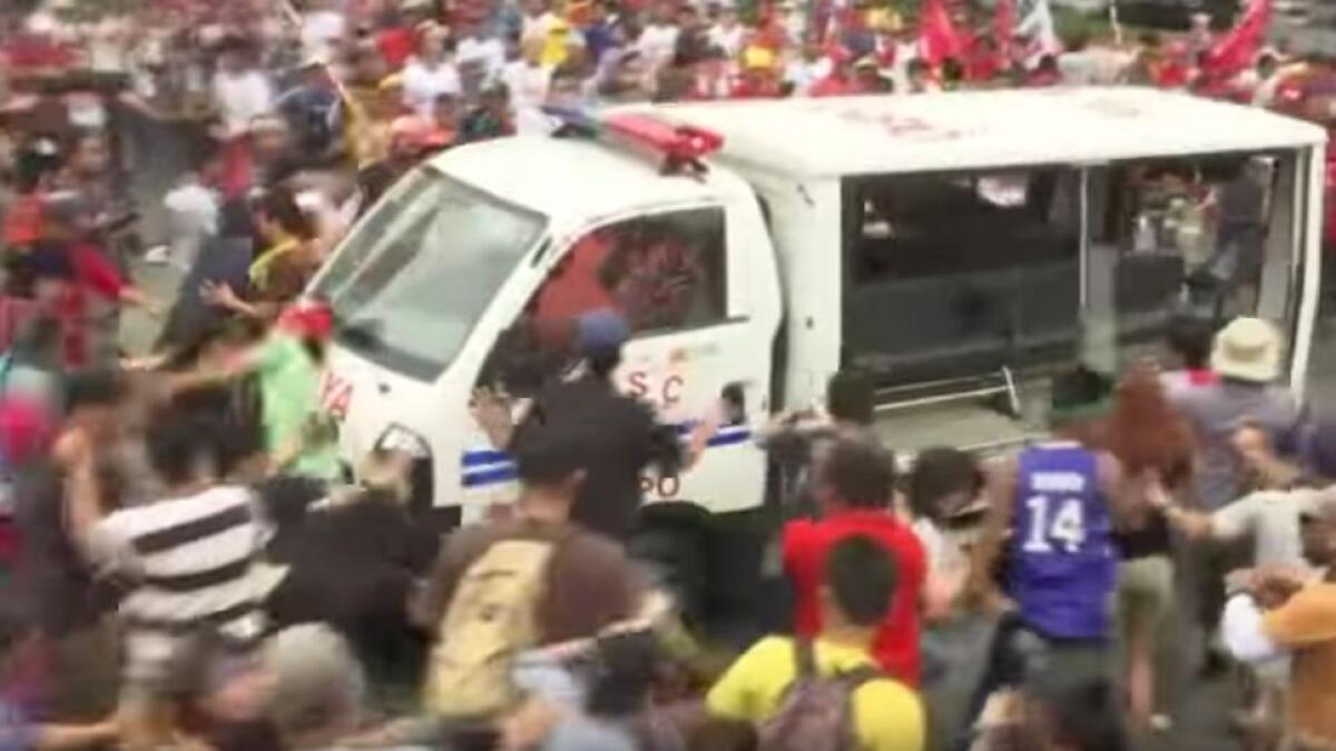 Graphic video: Police van rams into crowd in Philippines