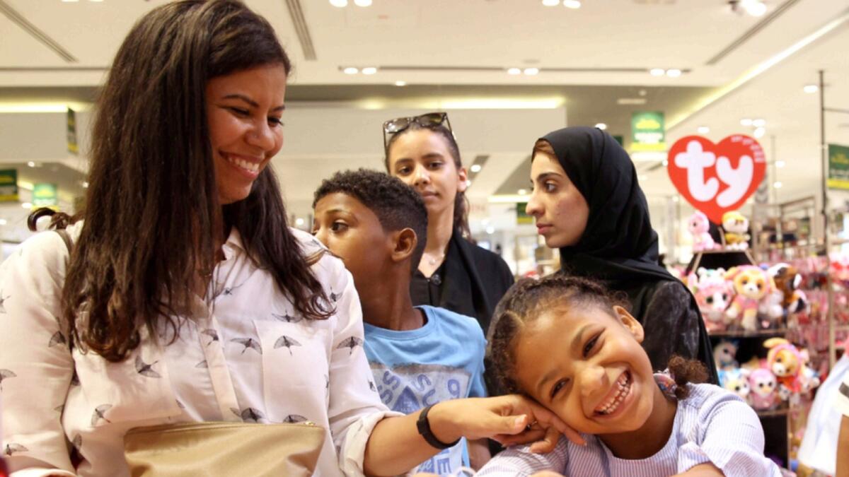 Children shop as part of 'Joy of Eid Clothing Project' in Dubai. — File photo