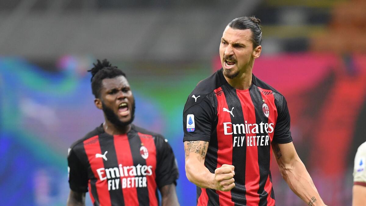 AC Milan’s Zlatan Ibrahimovic celebrates scoring their third goal with Franck Kessie.