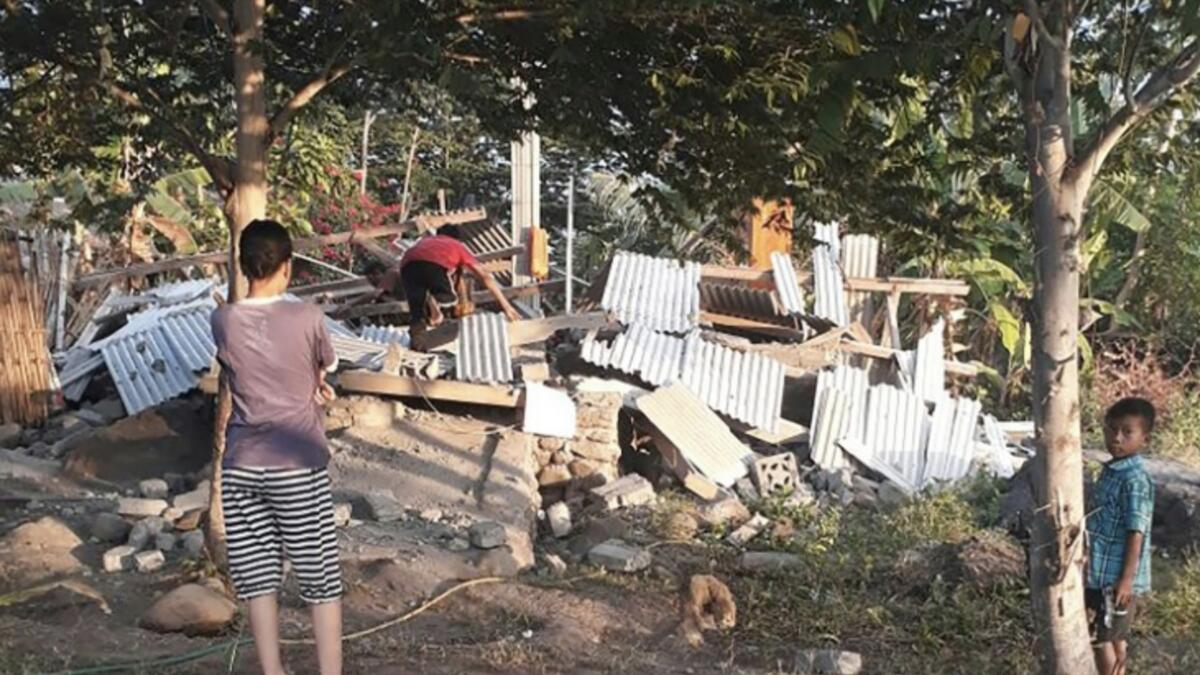 6.4-magnitude quake kills 14 in Indonesia