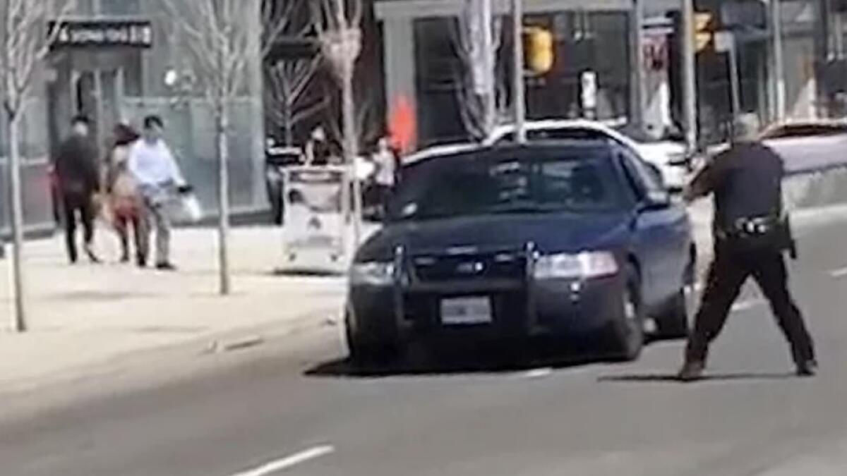 Video: Toronto police officer draws praise for refusing to shoot van suspect