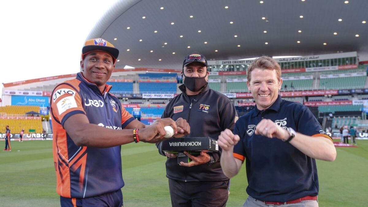 Dwayne Bravo with Abu Dhabi T10 officials. (Supplied photo)