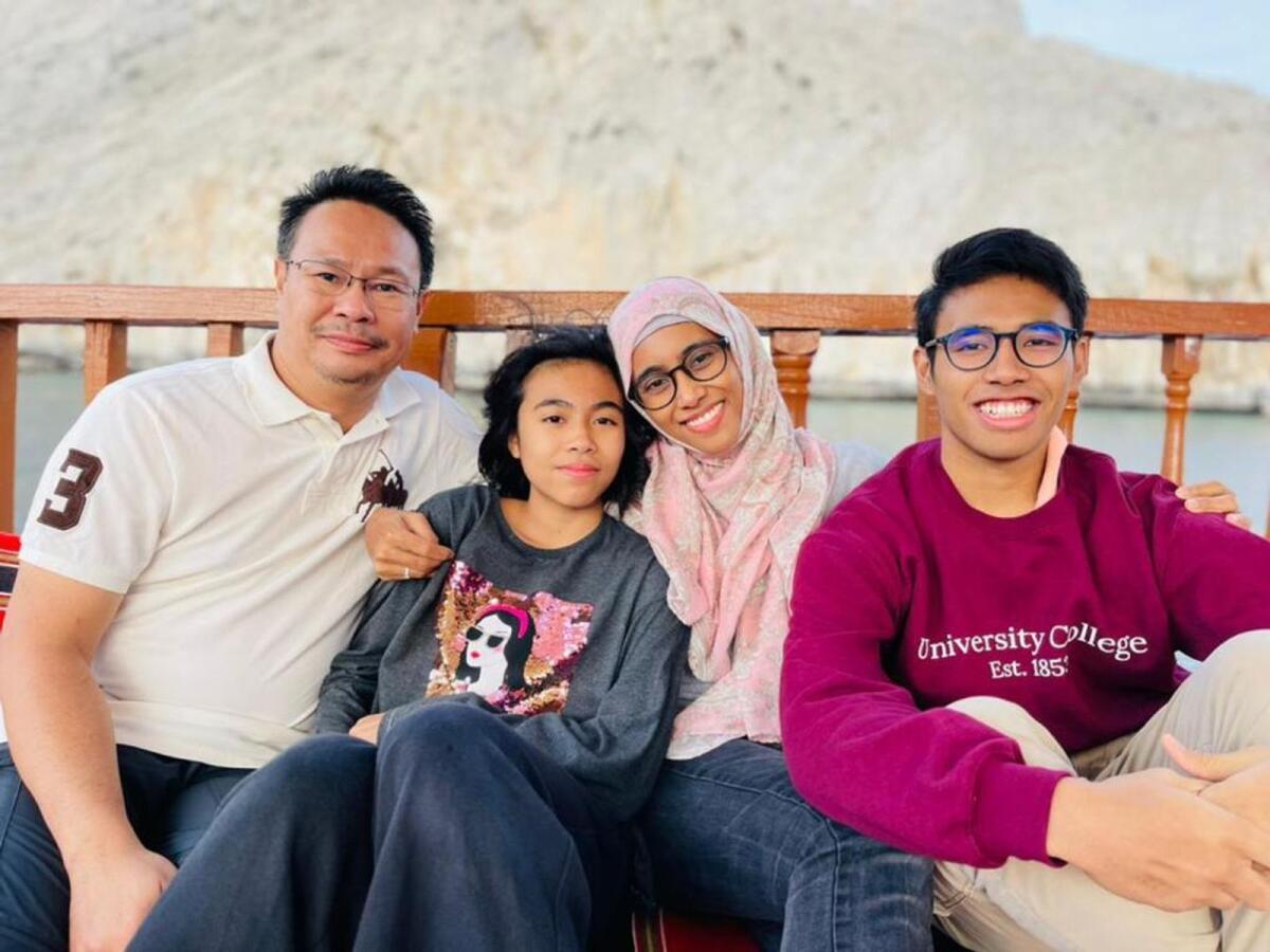 Malaysian expat Adilatul Salmiah Abdullah with her family. Photo: Supplied