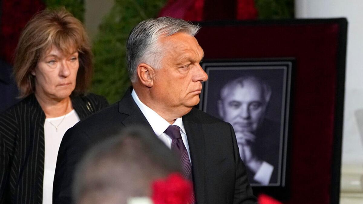Hungary's Prime Minister Viktor Orban walks to the coffin of former Soviet President Mikhail Gorbachev. – AP