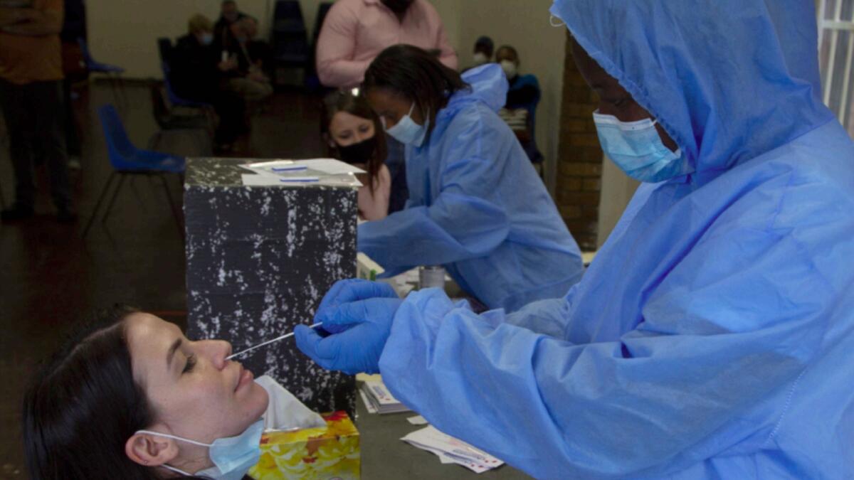 A nasal swab is taken to test for Covid-19 at a site near Johannesburg. — AP