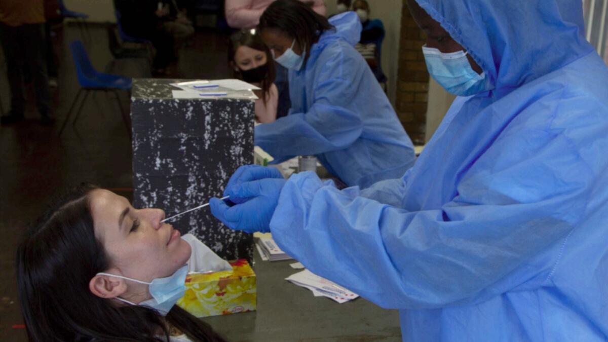 A nasal swab is taken to test for Covid-19 at a site near Johannesburg. — AP