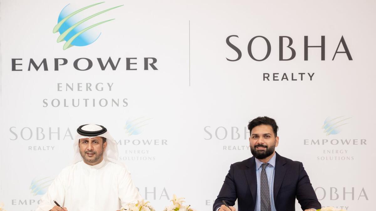 The agreement was signed by Ahmad bin Shafar, CEO of Empower, and Francis Alfred, Managing Director of Sobha Realty. - Supplied photo