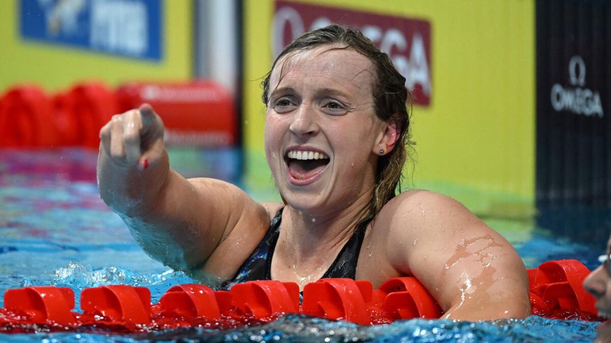 Katie Ledecky reacts after taking gold in the women's 1500m freestyle. (AFP)