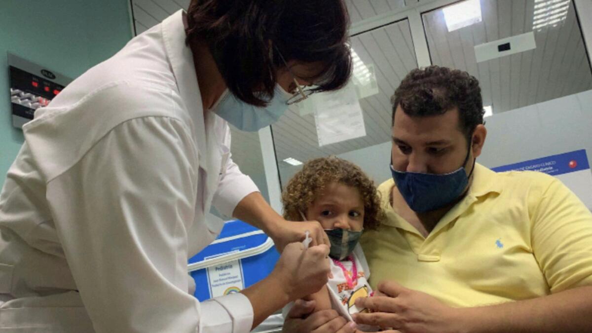 A 3-year-old child receives Covid-19 vaccine in Cuba. — AFP