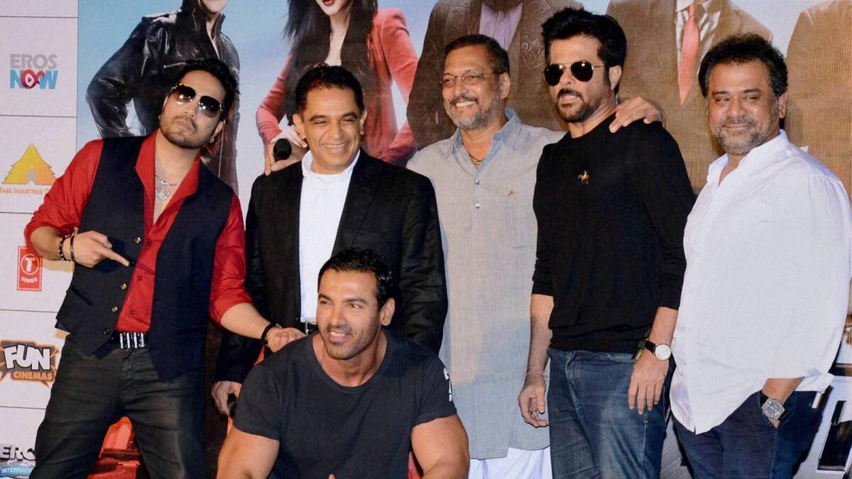 Mumbai : Bollywood actors Anil Kapoor, Nana Patekar, John Abraham, singer Mika Singh, filmmaker Anees Bazmee and Firoz Nadiadwala during the launch of title track song of film 'Welcome Back' in Mumbai on Saturday.