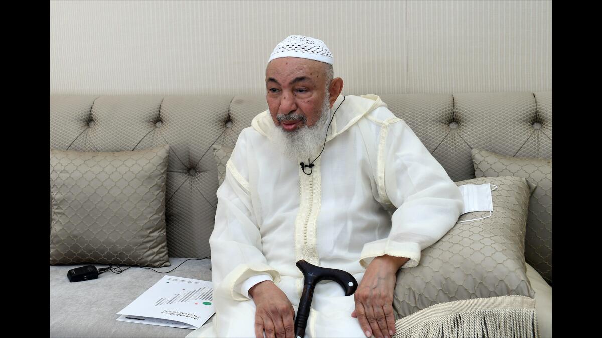 Sheikh Abdullah bin Bayyah getting the Covid-19 vaccine on Monday. — Wam photos