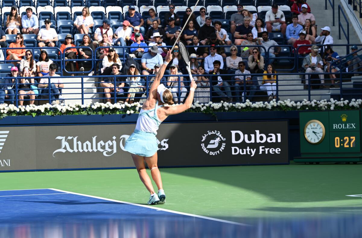 Liudmila Samsonova serves during her match in Dubai on Sunday. — Photo by Ehaab Qadeer