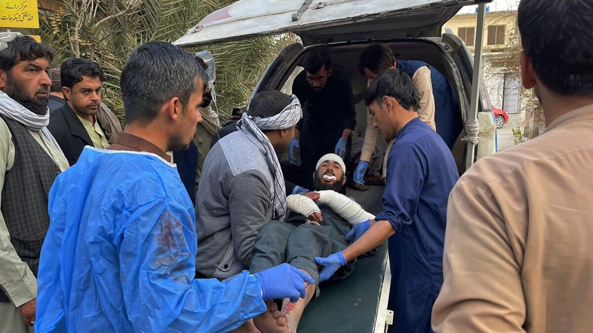 A man, who was injured in the Afghan forces shelling, transport to a hospital in Chaman, Pakistan on Sunday. — AP